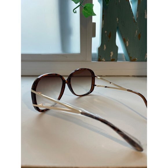 Modern Day Lux‎ Round Frame Cut Out Temple Detail Sunglasses Tortoise